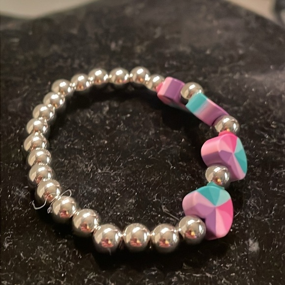 7” beaded stackable stretch bracelet with 23 silver beads & 4 heart shaped beads - Picture 7 of 13